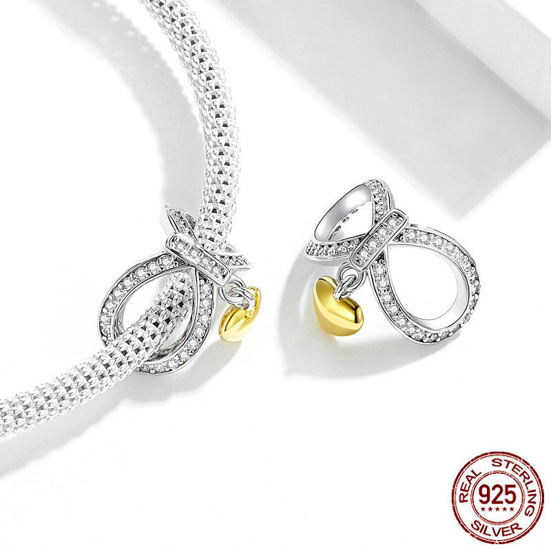 Heart Infinity Charm on silver bracelet