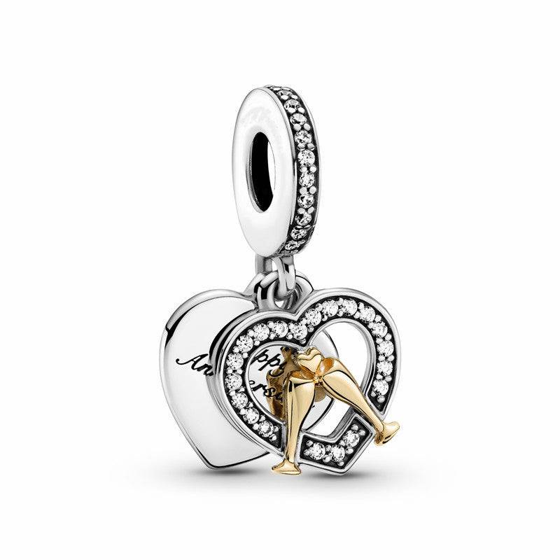 Elegant heart-shaped anniversary charm with sparkling stones