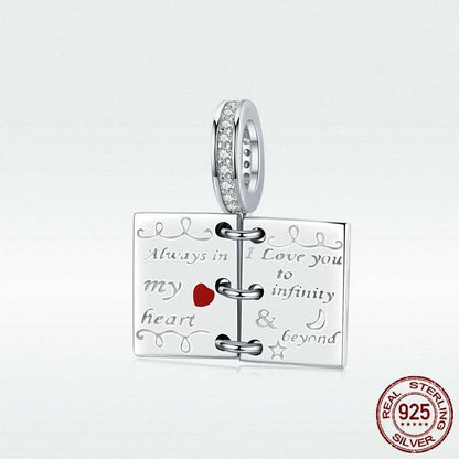 Sterling silver charm with love notes engraving