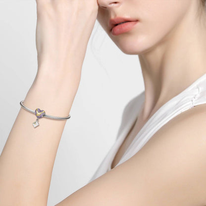 Love Letter Charm worn on wrist