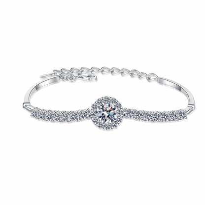 Silver Moissanite Bangle featuring a central sparkling moissanite stone and delicate accents, crafted in genuine silver for elegance.