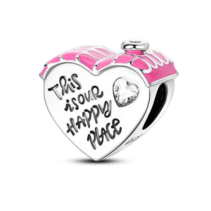 Heart charm with 'This is our happy place' text