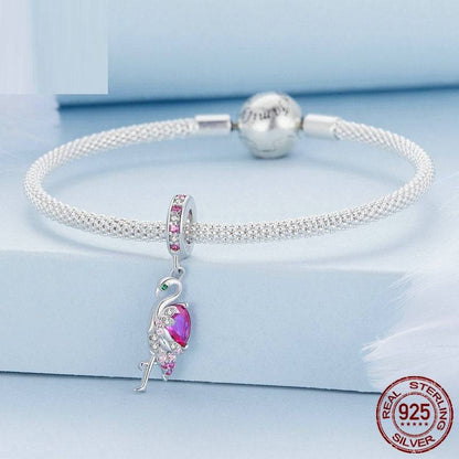 Flamingo charm on silver bracelet