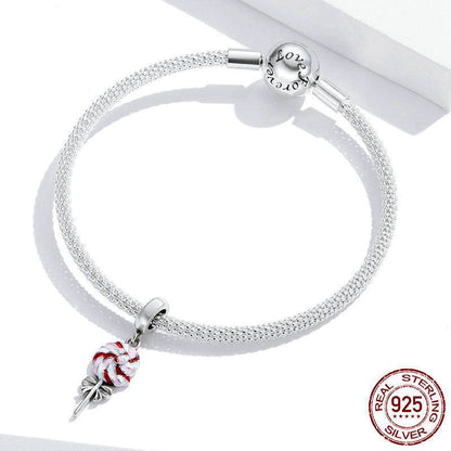 Bracelet with lollipop charm in red and white swirls