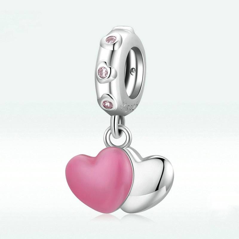 Pink Heart Tag Charm in sterling silver with pink enamel heart and crystal accents, perfect for jewelry collections.