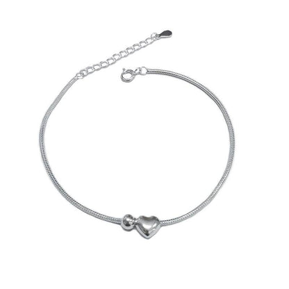 Heart Bead Silver Bracelet featuring a delicate silver chain with a heart-shaped charm, perfect for romantic and timeless jewelry lovers.