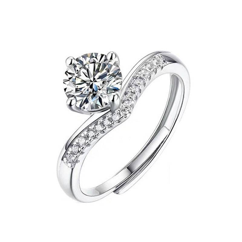 Princess Crown Silver Moissanite Ring with a 1 carat moissanite stone. Adjustable silver band with embedded accent stones for added elegance.