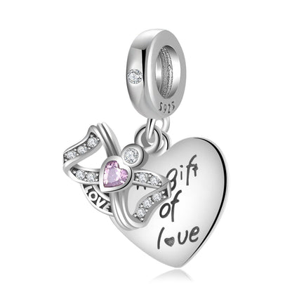 Close-up of Gift of Love Charm with heart design