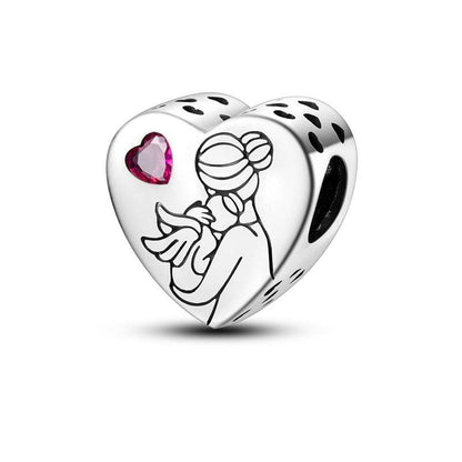 Heart charm with mother and baby illustration