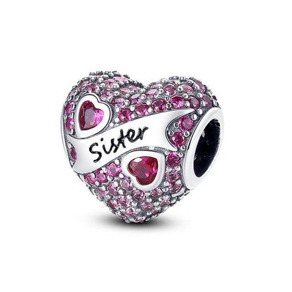 Heart charm with pink stones and 'Sister' text