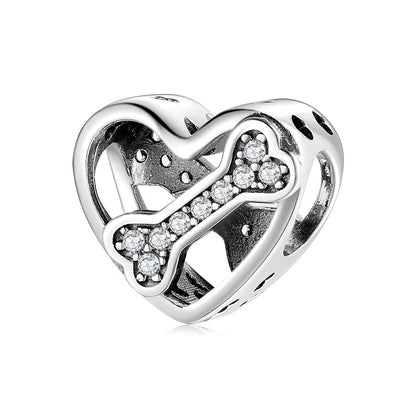 Heart charm with crystal bone design