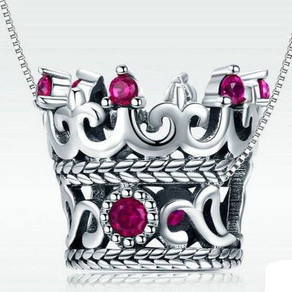 Crown charm pendant with red accents